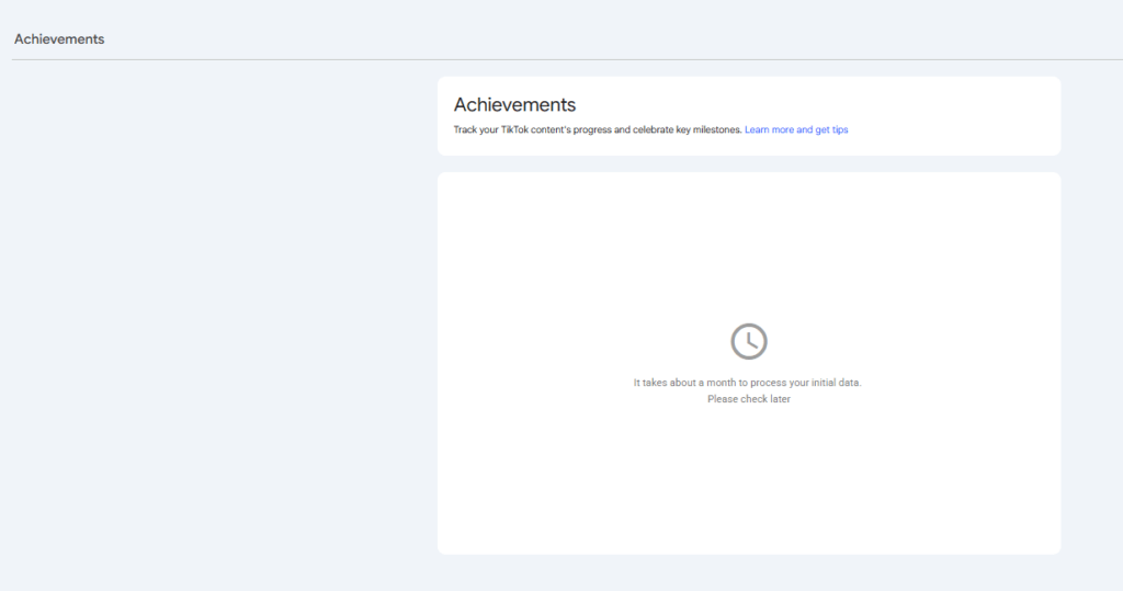 Achievements dashboard in Google Search Console showing a clock icon and a message stating that it takes about a month to process initial data.